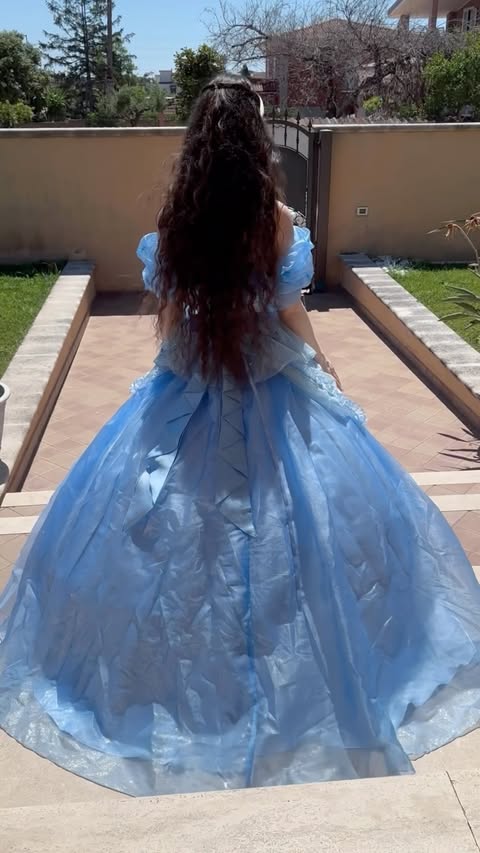 Instagram post by @arual.bloom for Miccostumes. Caption reads: [...] for the spell🪄✨💙 Cosplay Dresses by....