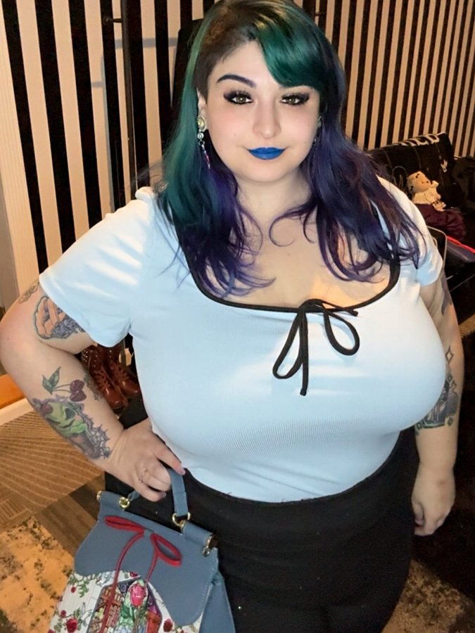 Instagram post by @insydious_beauty for BoxLunch. Caption reads: [...] Plugs from @gorgeplugs 💙💗🧪 Bag from....