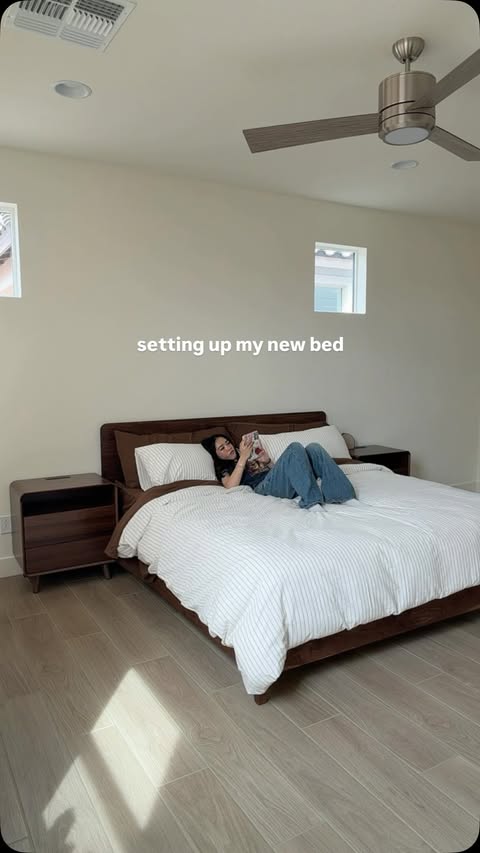 Instagram post by @readingslumped for Avocado Green Mattress. Caption reads: setting up my new bed with @avocado.green 💚 aka....