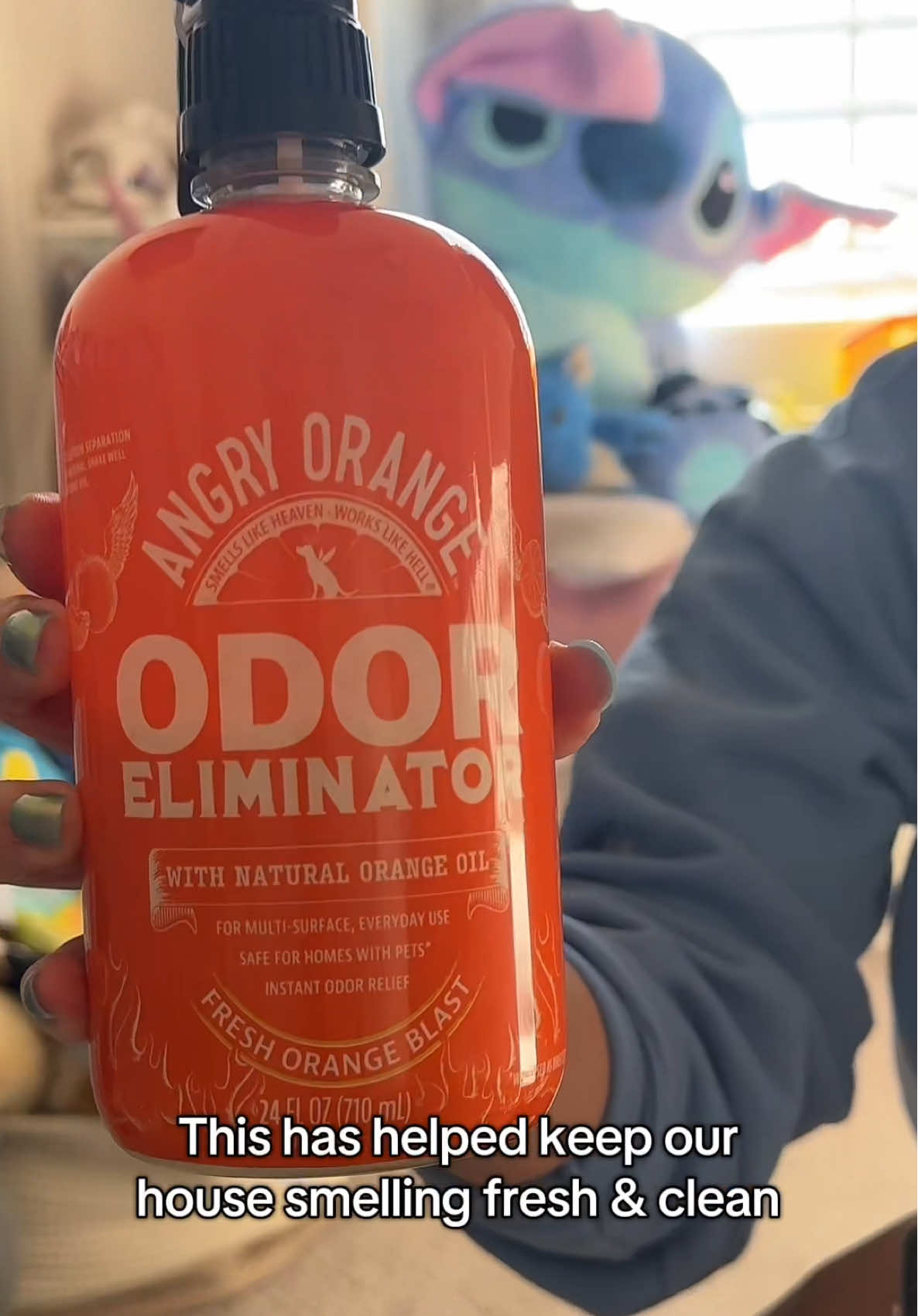 TikTok post by @blessedandoutnumbered for Angry Orange. Caption reads: Angry Orange eliminates pet odors instead of just....