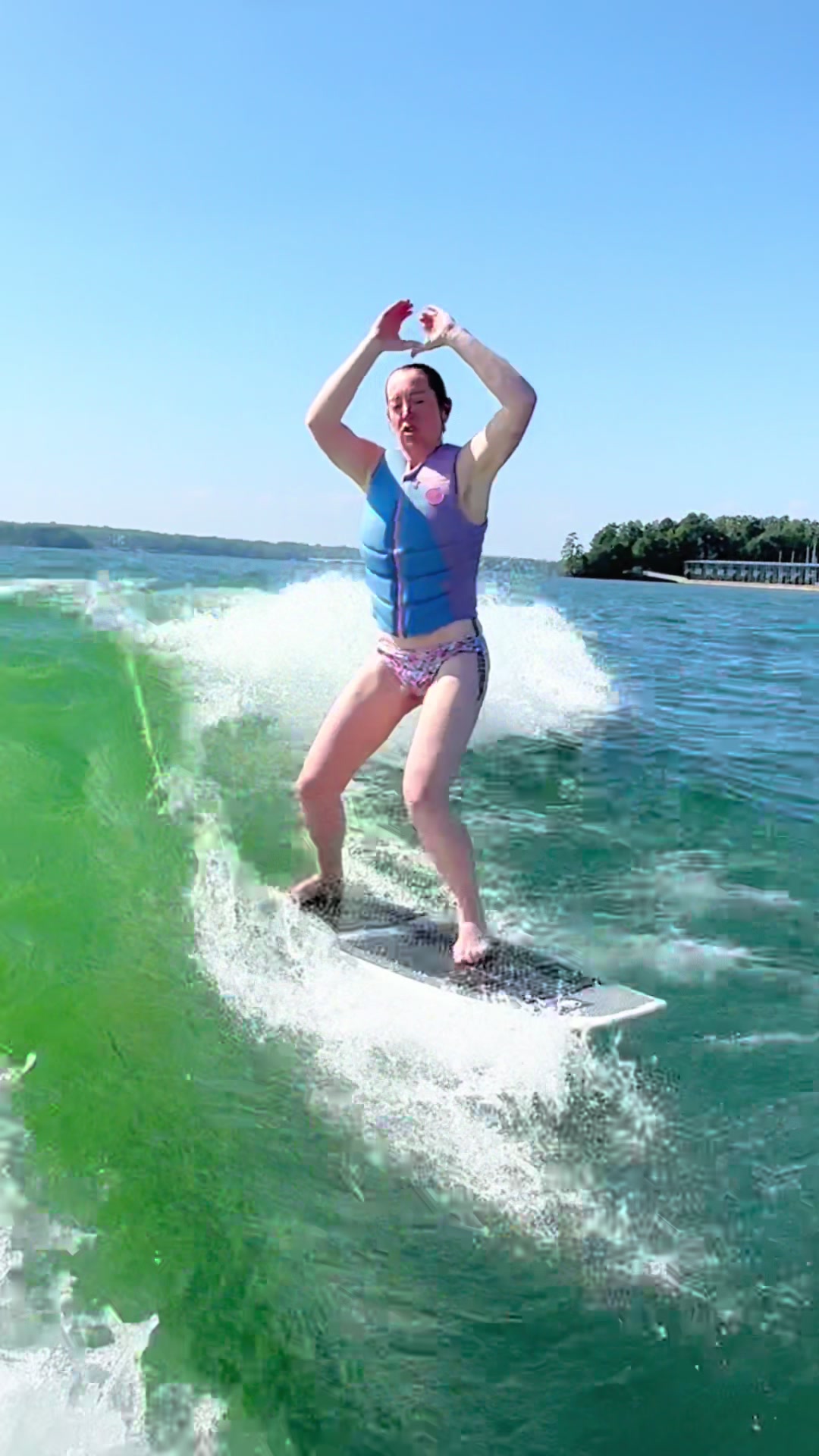 TikTok post by @ladyspinedoc for Liquid Force. Caption reads: 🍎🏄‍♀️ Jacket and board by @liquidforcewake....