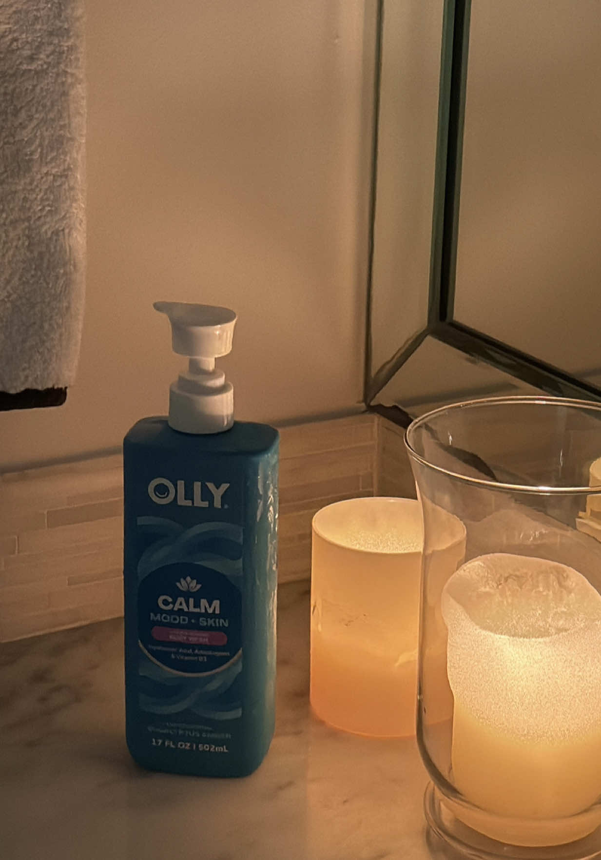 TikTok post by @itsamandadewitt for LTK. Caption reads: The new @OLLY Wellness Body Wash is the perfect....