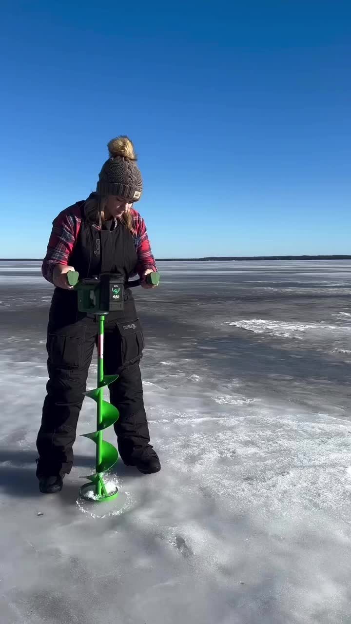 TikTok post by @that_michigan_gal for DSG Outerwear. Caption reads: this IS the life 🎣✨ @DSG Outerwear #icefishing.