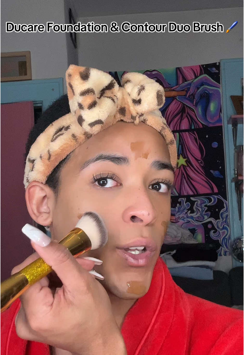 TikTok post by @xaviarthompson for DUcare Beauty. Caption reads: @DUcare beauty Foundation & Contour Duo Brush....