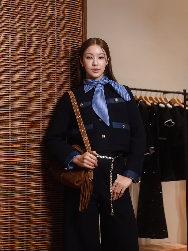 Instagram post by @namtan.tipnaree for Maje. Caption reads: [...] with a touch of Parisian chic. Discover....
