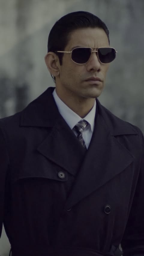 Instagram post by @yashrajchouhanofficial for John Jacobs Eyewear. Caption reads: A city doesn’t wake up with the sunrise, it wakes....