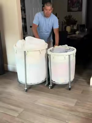 TikTok post by @karlabarrios41 for Songmics. Caption reads: [...] #laundrybasket #tiktokshopcreatorpicks....