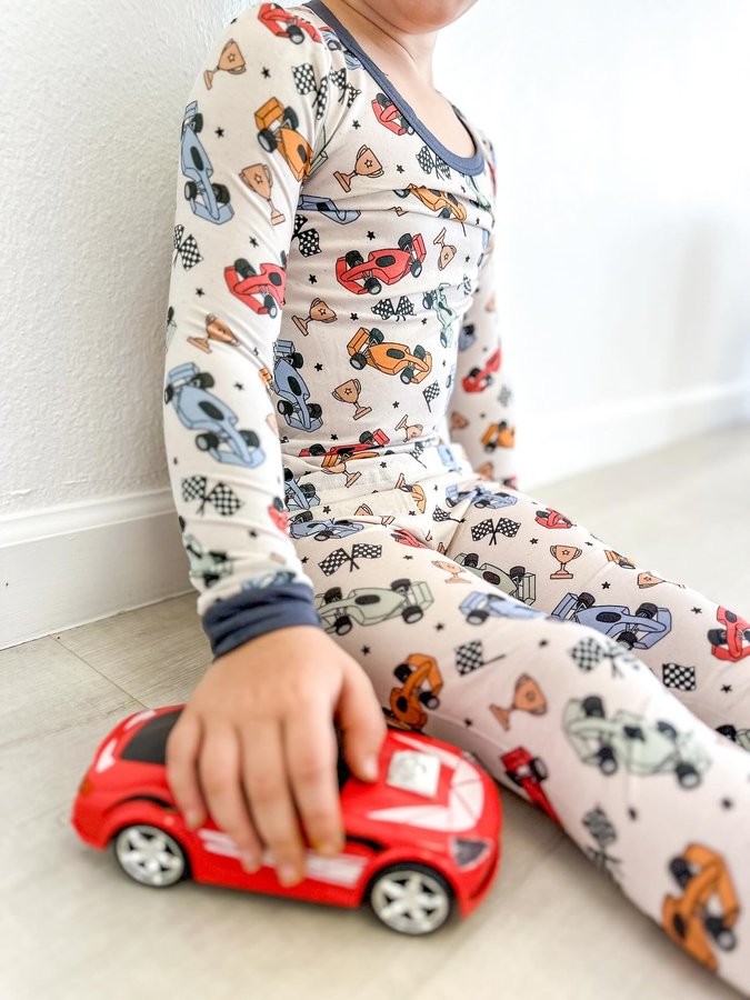 Instagram post by @thevanessaporter for Caden Lane. Caption reads: [...] premium bamboo pajamas from @cadenlane 🏎️....