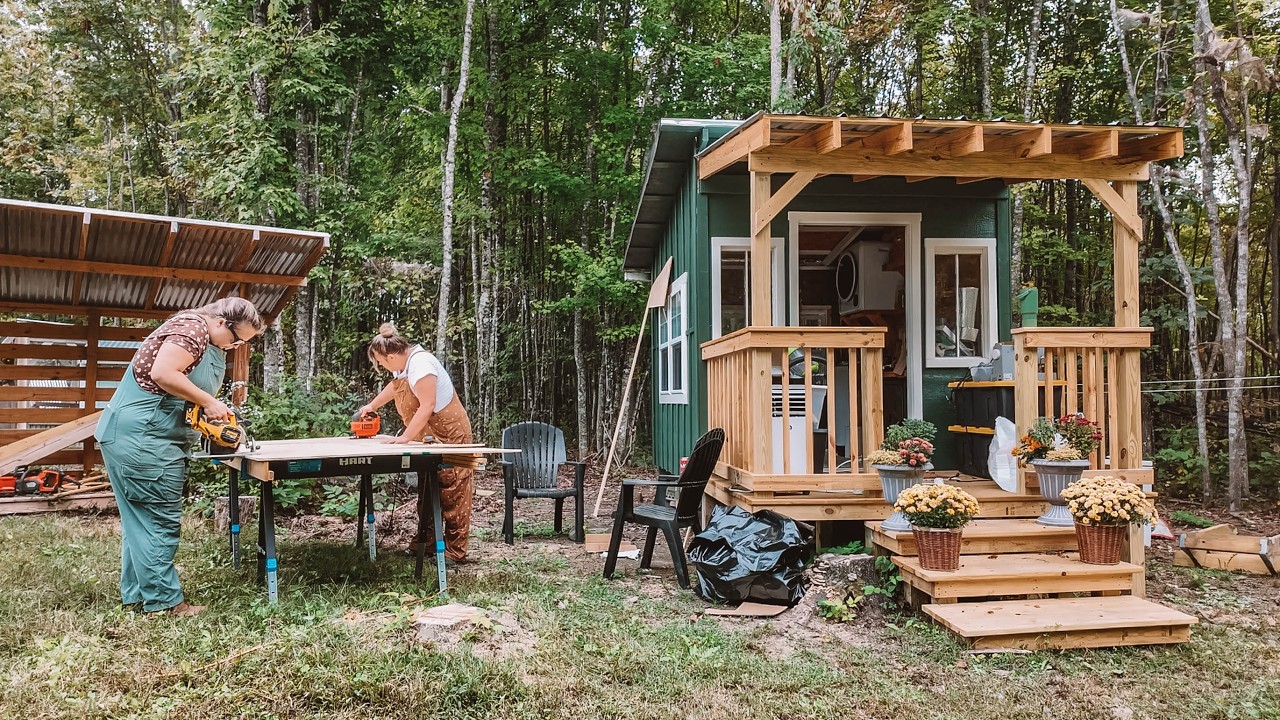 YouTube post by @HEYWANDERER for Azure Standard. Caption reads: Simple off grid living: cozy meals & building a....