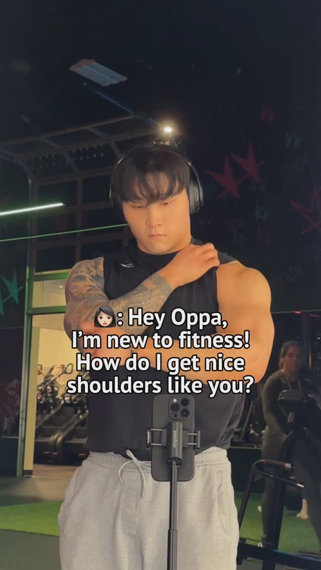Instagram post by @thekoreanhulk for Boba Tea Protein. Caption reads: Easy! Oppa gotchu ⬇️ 

1. DB Shoulder Press....
