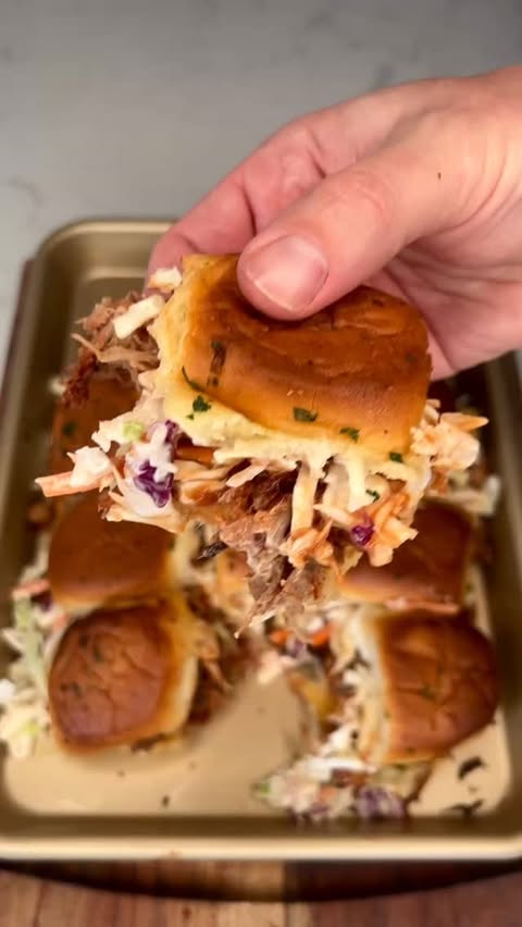 Instagram post by @bacusbbq for Kamado Joe. Caption reads: [...] of my favs. Cooked low and slow on my....
