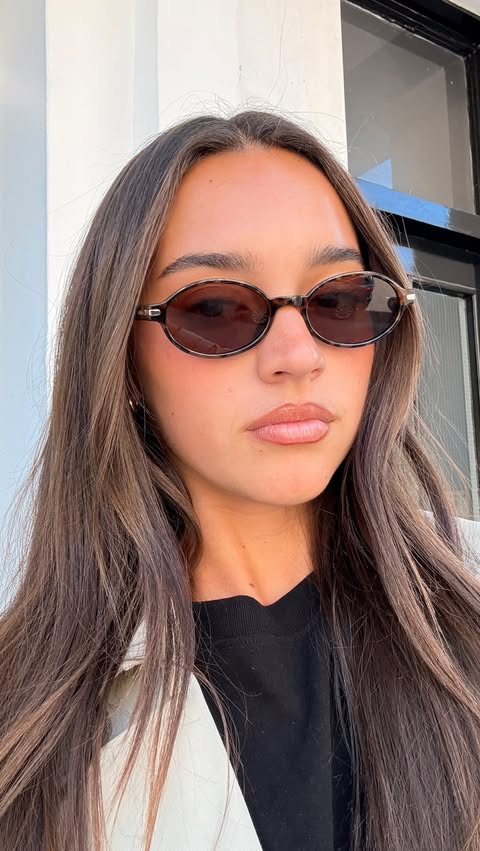 Instagram post by @millyadamson for QUAY. Caption reads: quays summer collection is gorg @quayaustralia....