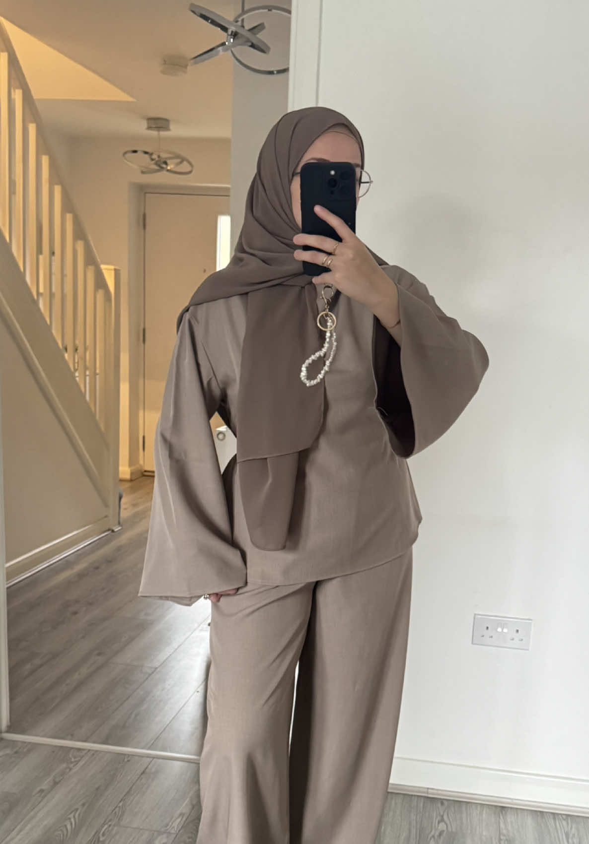 TikTok post by @noorimx for emlavish. Caption reads: @emlavish Co ord🫱🏽‍🫲🏼 #ootd #hijabigirls .