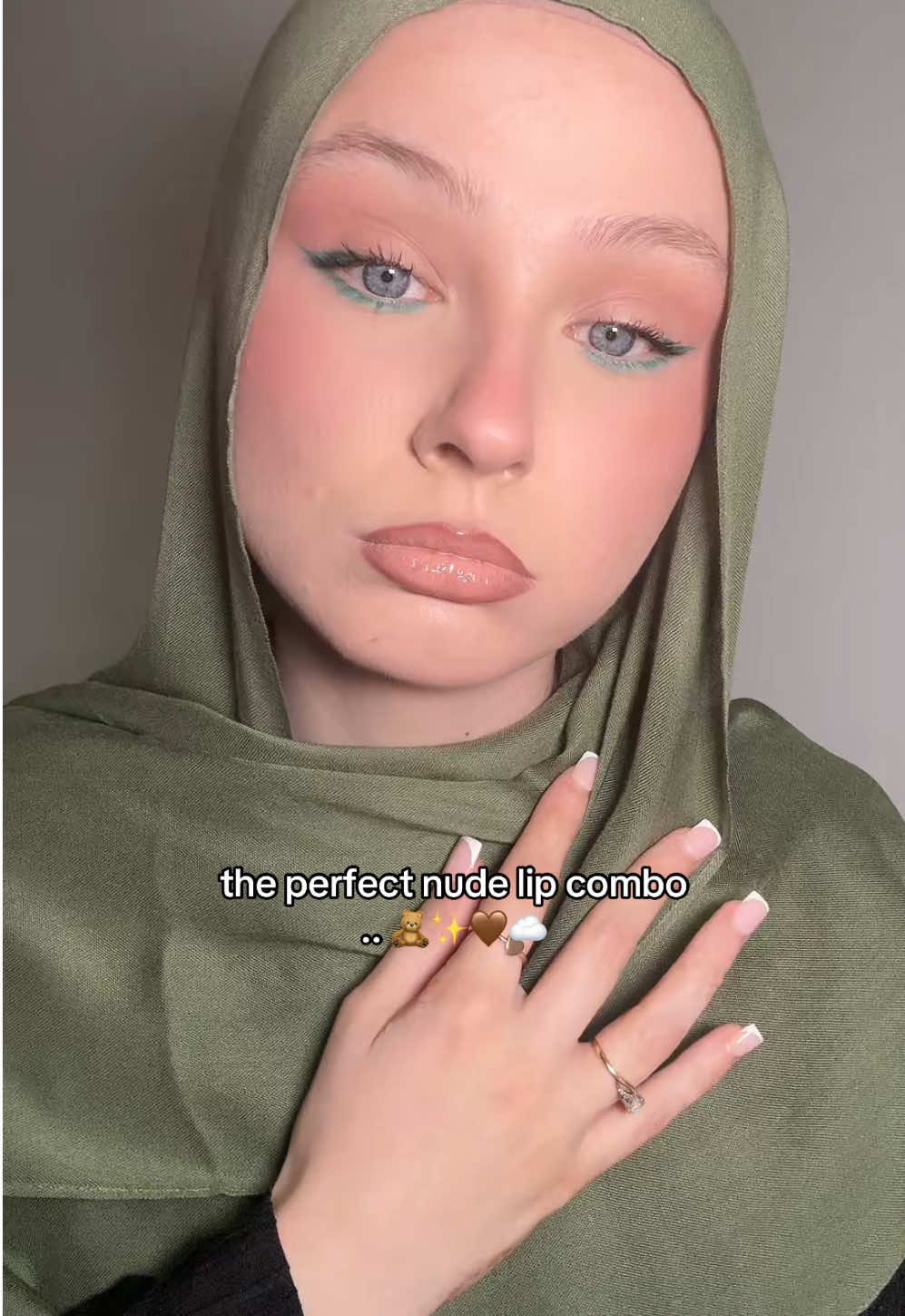 TikTok post by @aaliyaahx99 for HNB Cosmetics. Caption reads: [...] shine lipgloss - shade 02 #lipcombo....