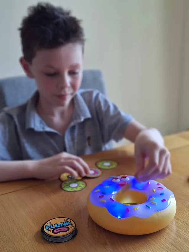 Instagram post by @laus2007 for TOMY. Caption reads: [...] the weekend playing Donut Dunk by....
