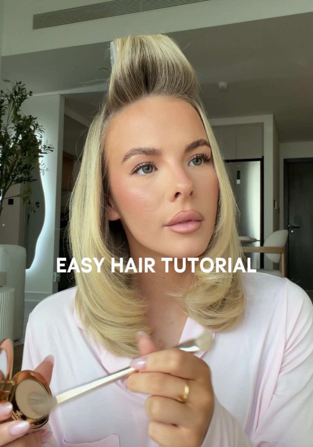 TikTok post by @beautybyellieparkhurst for BeautyWorks. Caption reads: [...] Works x Molly-Mae hot brush 🤎 ad....