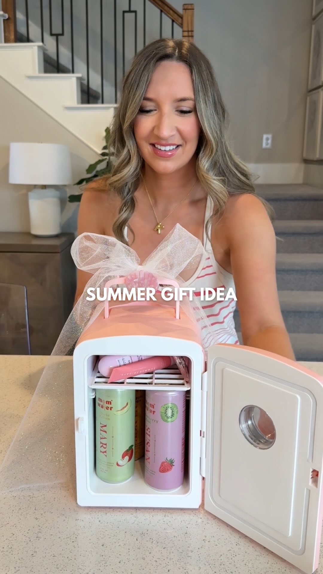 Instagram post by @kristinnicolemiller_ for Mom Water. Caption reads: [...] to get everything sent to your DMs!....