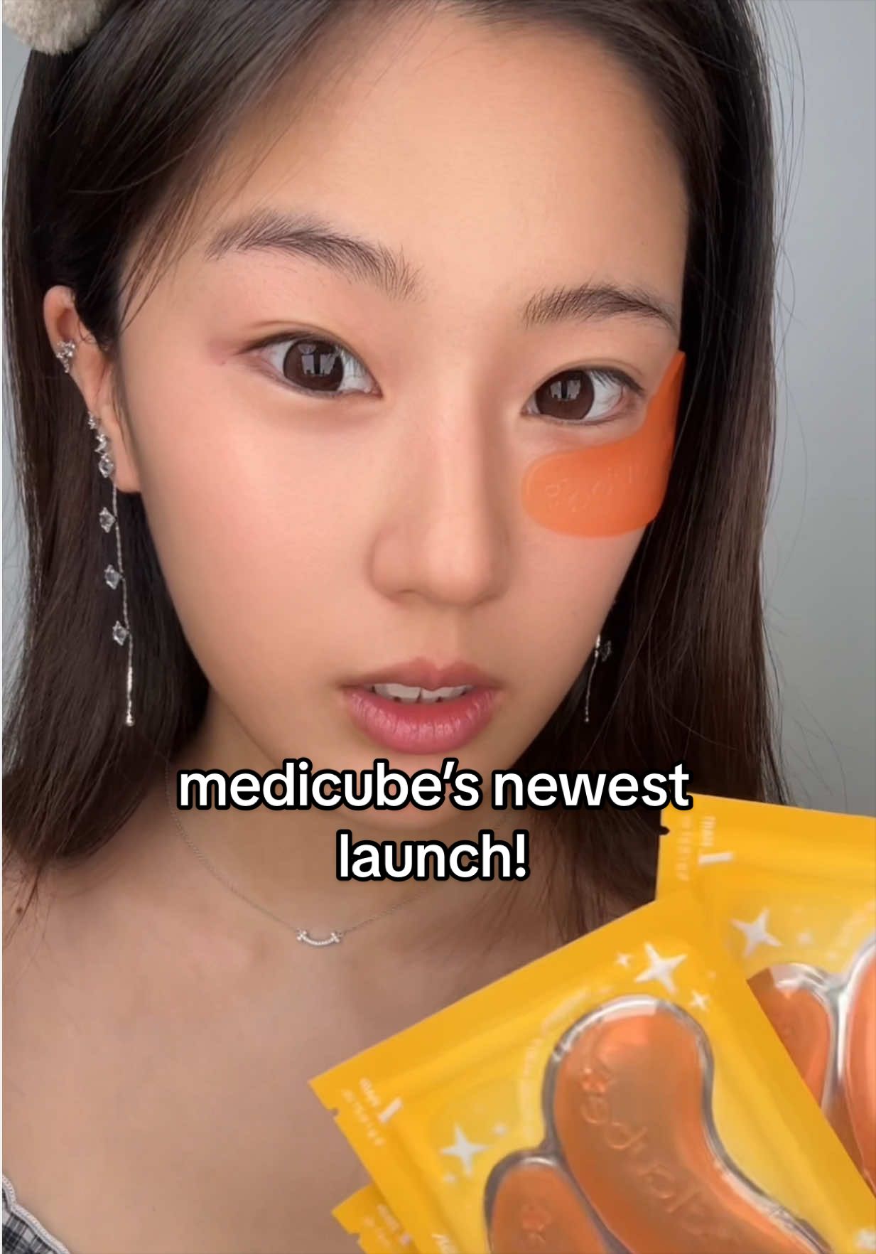 TikTok post by an influencer for Medicube. Caption reads: [...] duo in our eye patches now! @medicube global....