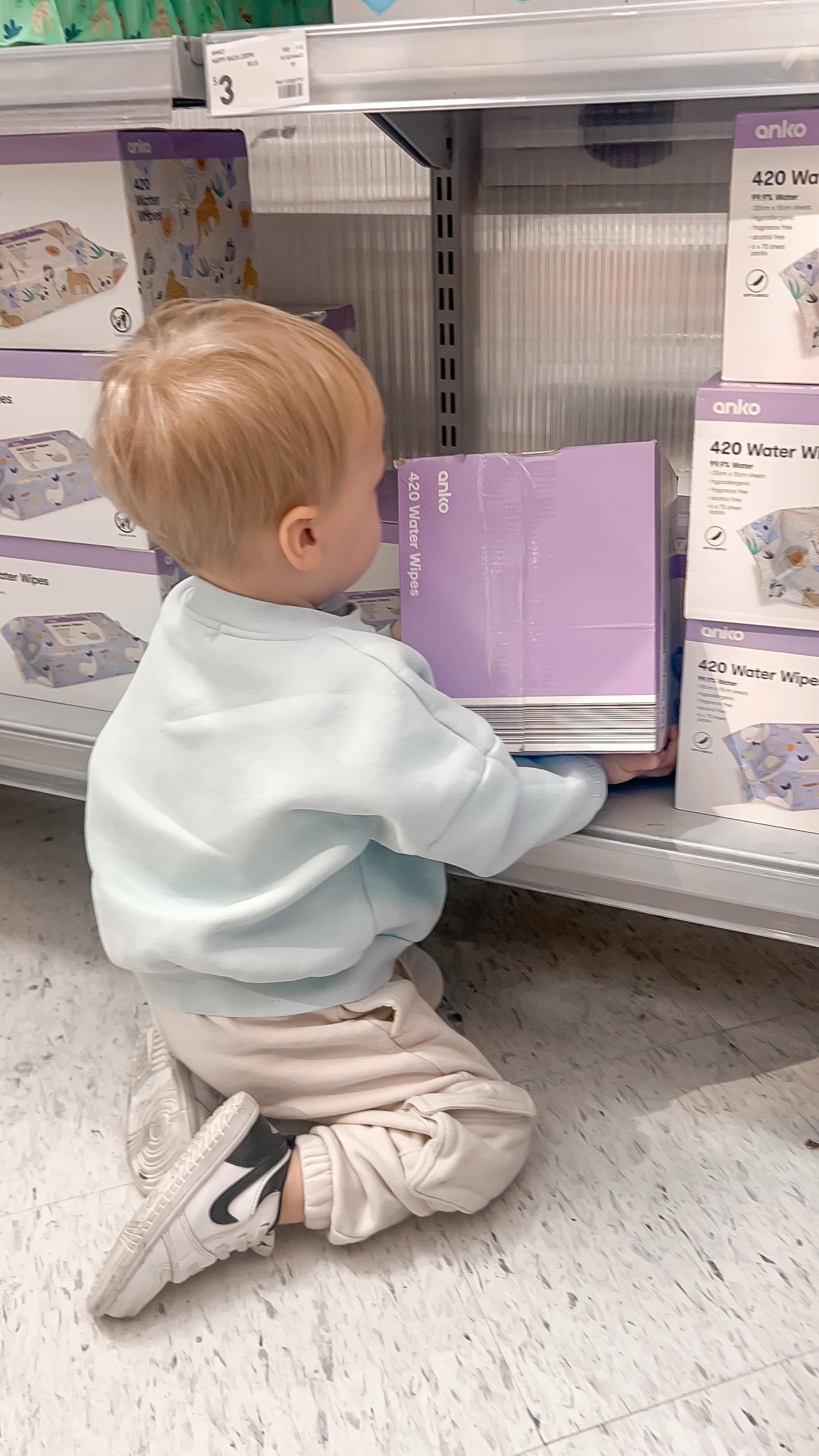 Instagram post by @johnny.and.jax for Kmart. Caption reads: Come with us to buy the new ANKO water wipes from....