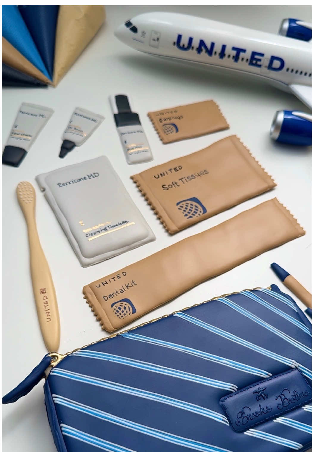 TikTok post by @united for Perricone MD. Caption reads: [...] amenity kit by @Brooks Brothers stuffed with....