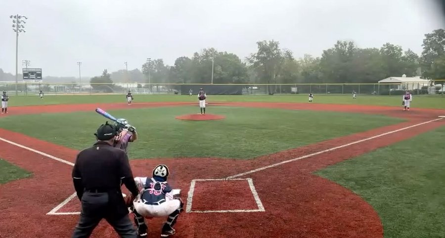 Instagram post by @vinny_potsnpans for Axe Bat. Caption reads: 3 games in the 🌧️ #baseballlife 

Championship....