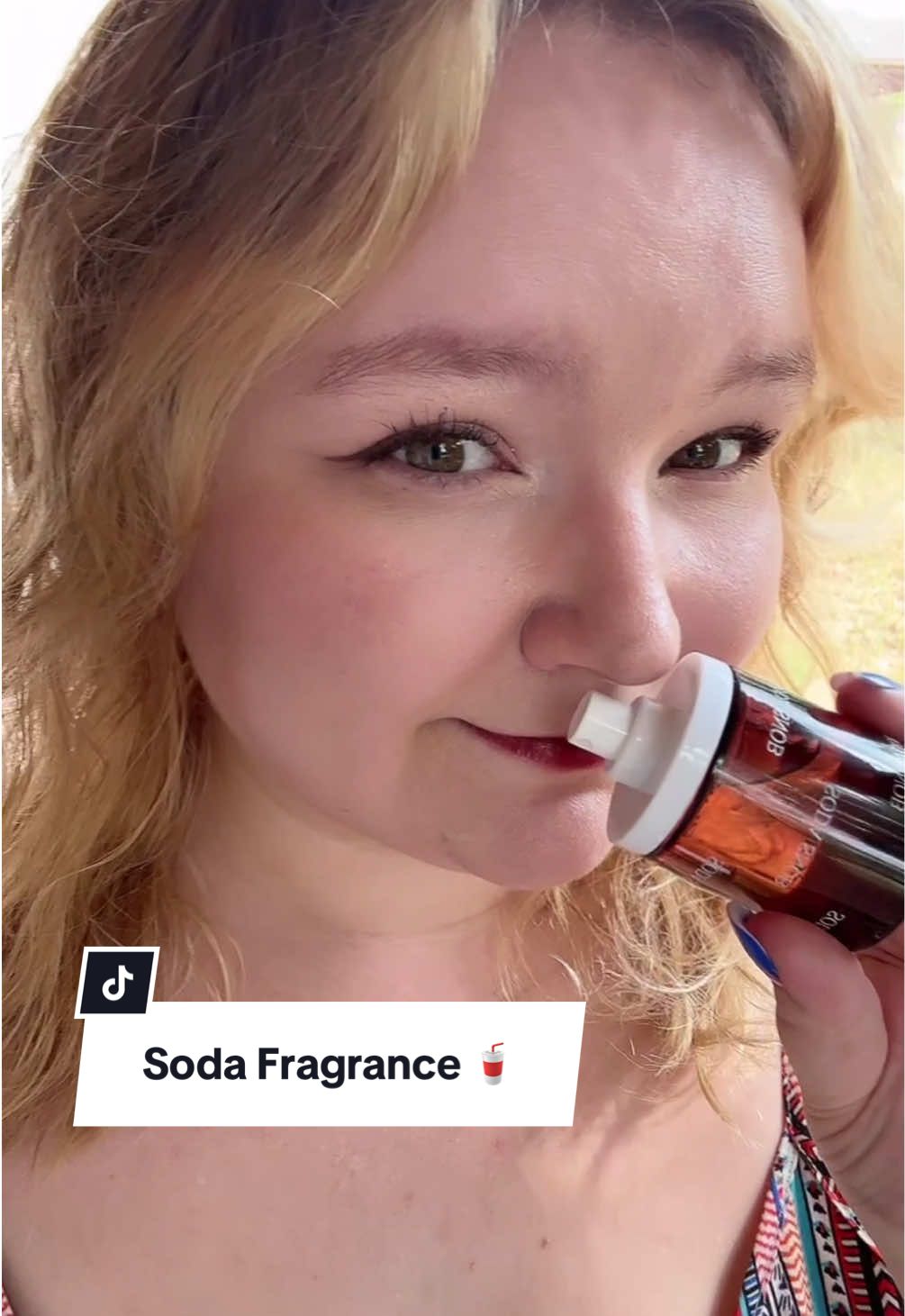 TikTok post by @n.caila for Snif. Caption reads: Such a fun and wearable scent! @Snif....