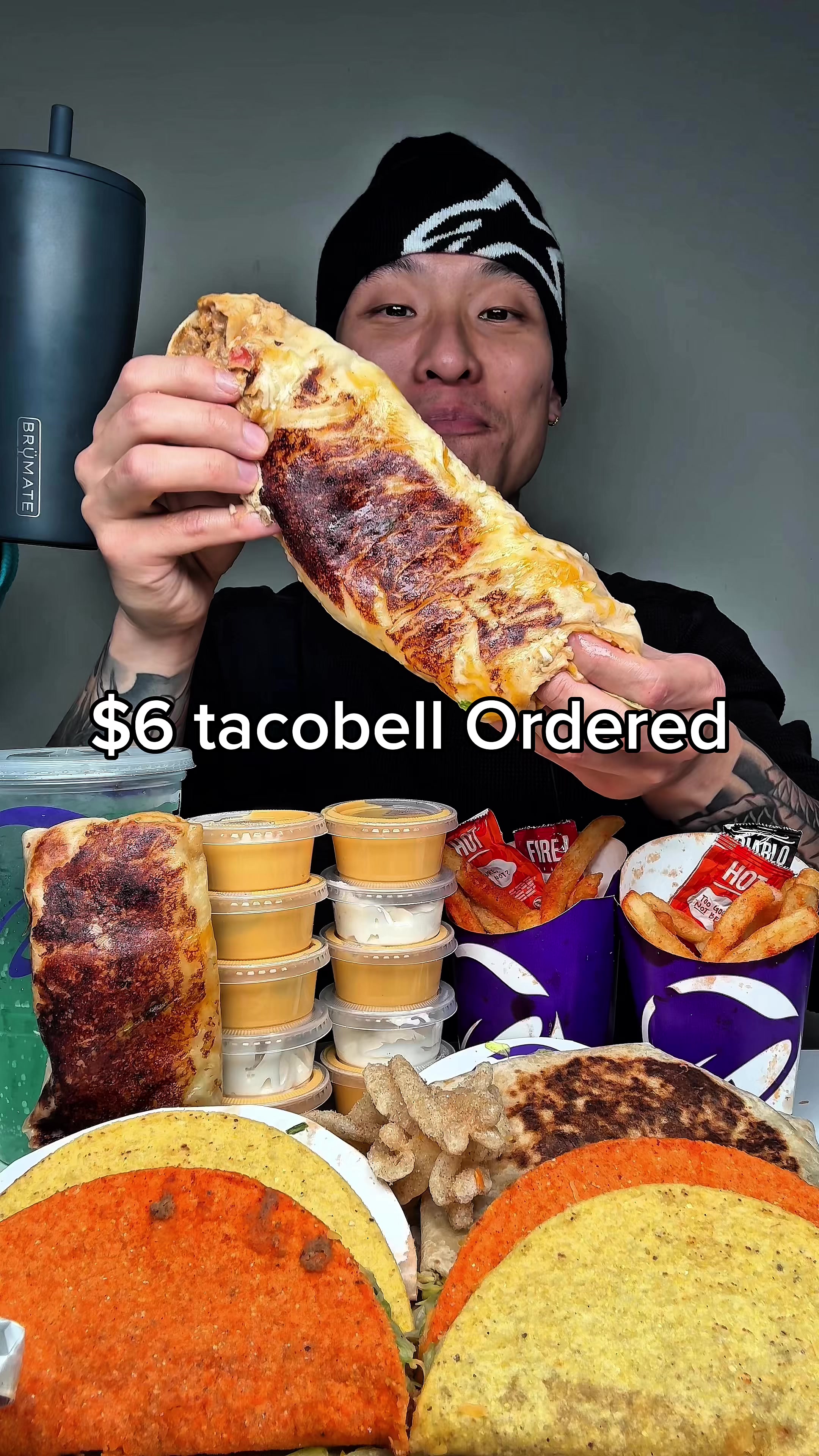 TikTok post by @shhhhimeating for BruMate. Caption reads: My tacobell order with @BrüMate #brumatepartner....
