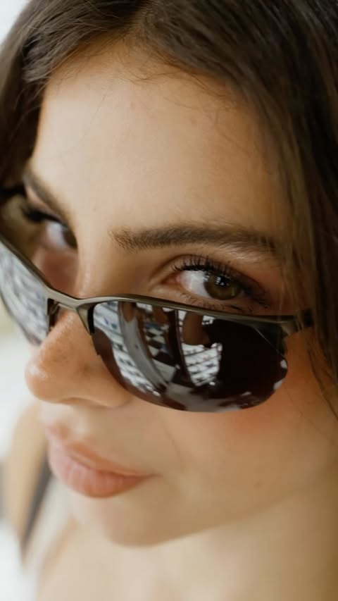 Instagram post by @doa.evrenn for Sunglass Hut. Caption reads: See it your way🖤 @sunglasshut #ownyourmoment....