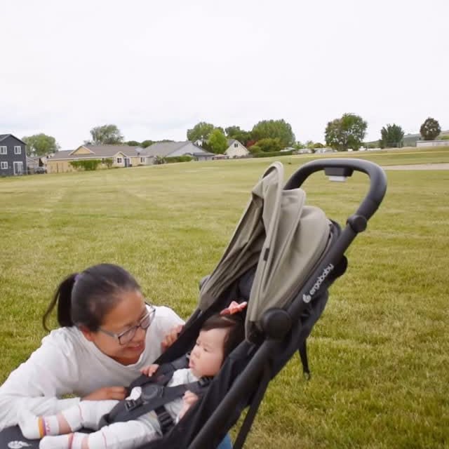 Instagram post by @bossbabykiki for Ergobaby. Caption reads: [...] big kids and a 6-month-old baby!....