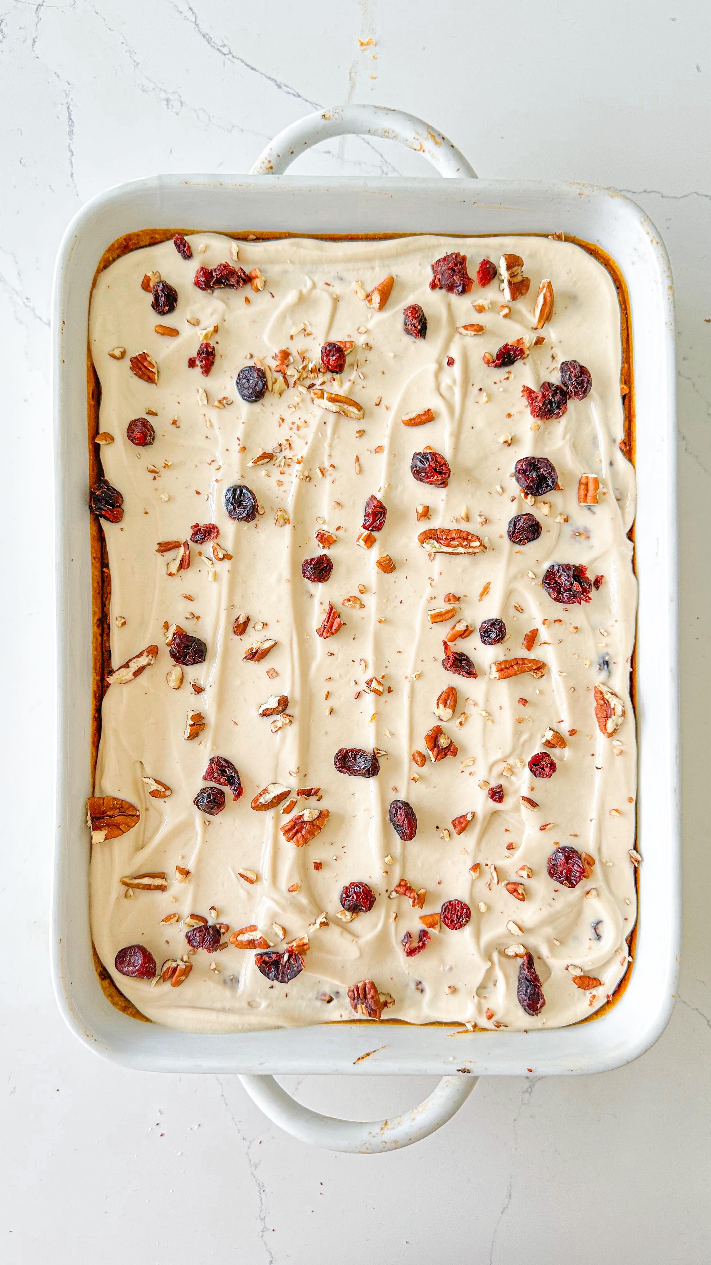 Instagram post by @that.veganbabe for PBfit. Caption reads: Pumpkin Spice 🎃 Baked Oats = the ultimate fall....