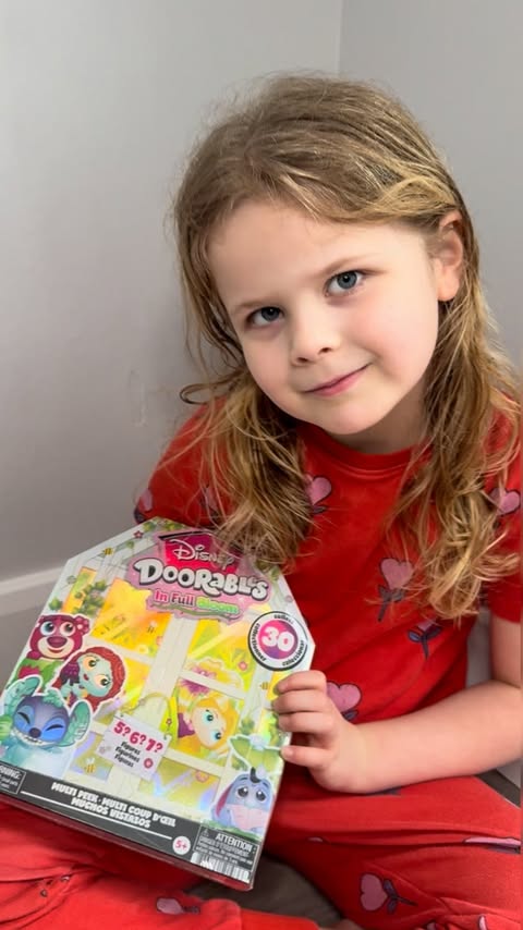 Instagram post by @two_littlepickles for Disney Doorables. Caption reads: ad| Everly loves how cute these new Disney....