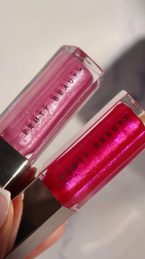 Instagram post by @naomimizrahi for FENTY BEAUTY BY RIHANNA. Caption reads: Pink sparkly lips 💋🩷✨ @fentybeauty gloss bomb....