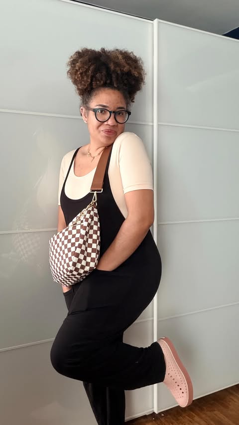 Instagram post by @thatcurlyhairmom for Canvelle. Caption reads: [...] with the new checkered crescent bag....