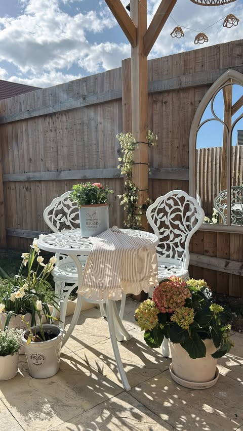 Instagram post by @homeattheharcourt for Yaheetech. Caption reads: [...] is this antique floral bistro set from....