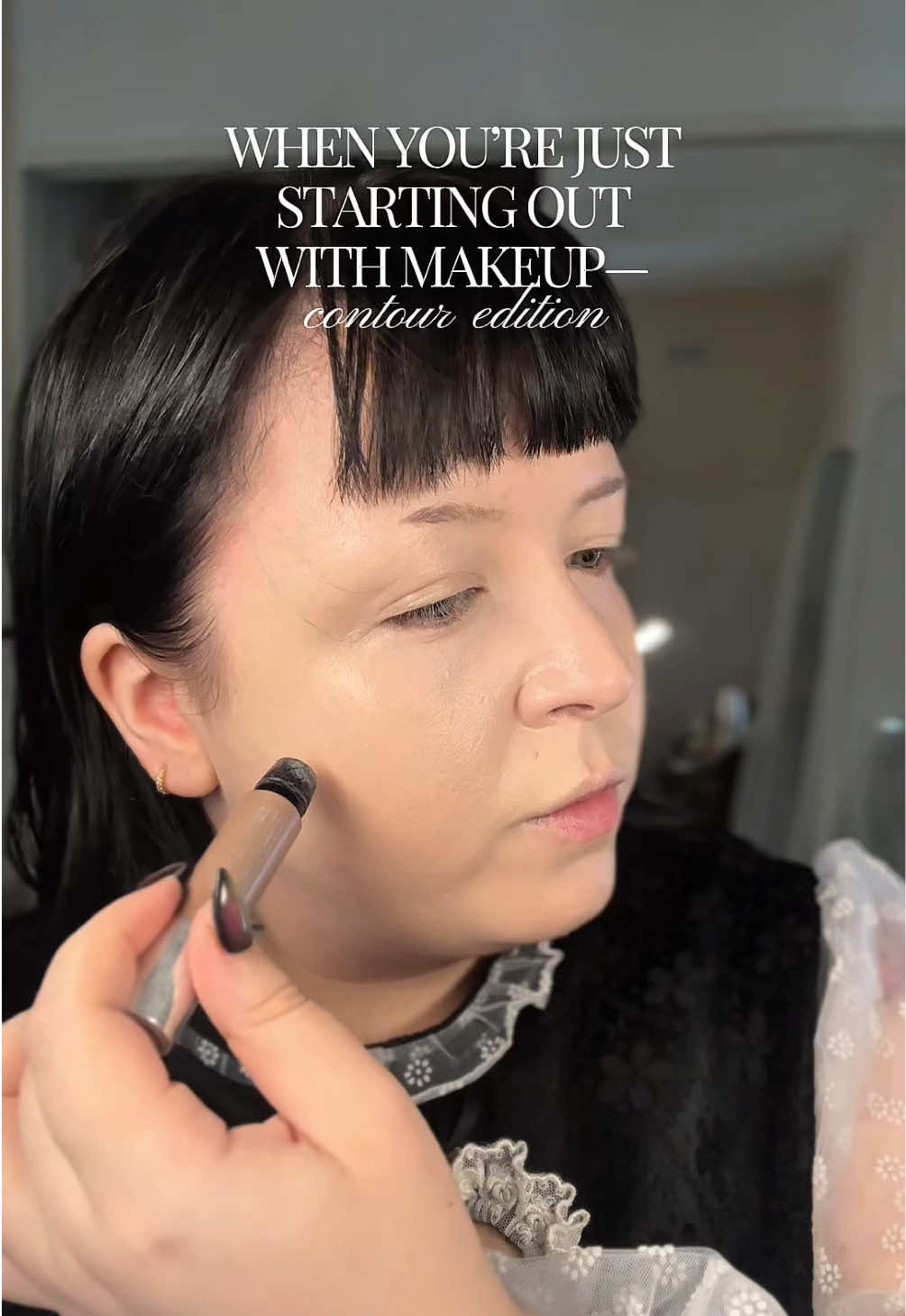 TikTok post by @thebrontemarie for Haus Labs. Caption reads: a lesson in why you should contour and how to....