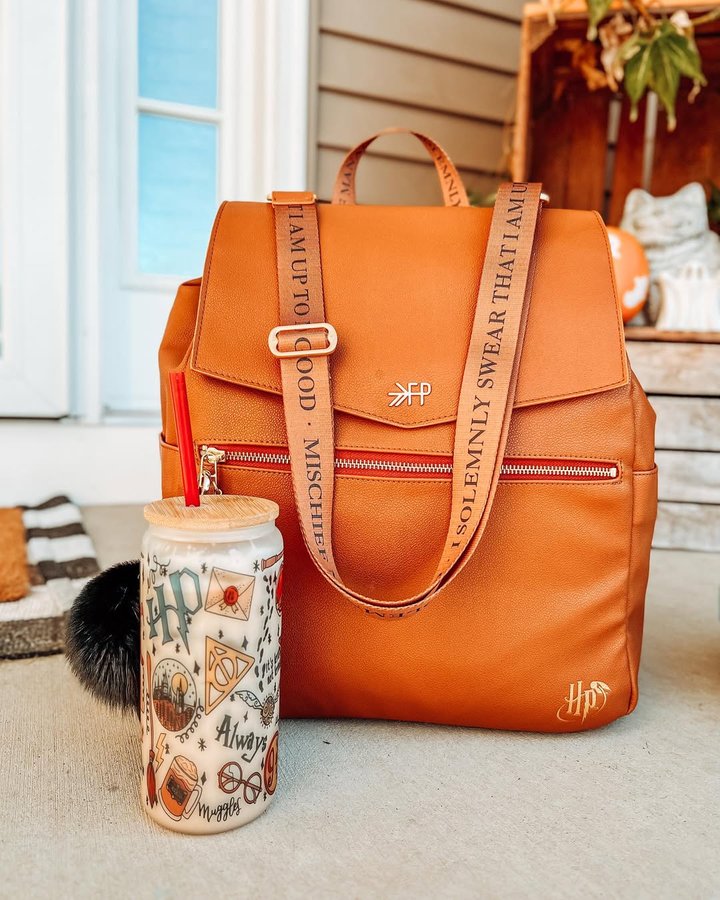 Instagram post by @kimberlie.kathleen for Freshly Picked. Caption reads: Errand essentials with a toddler: iced coffee and....