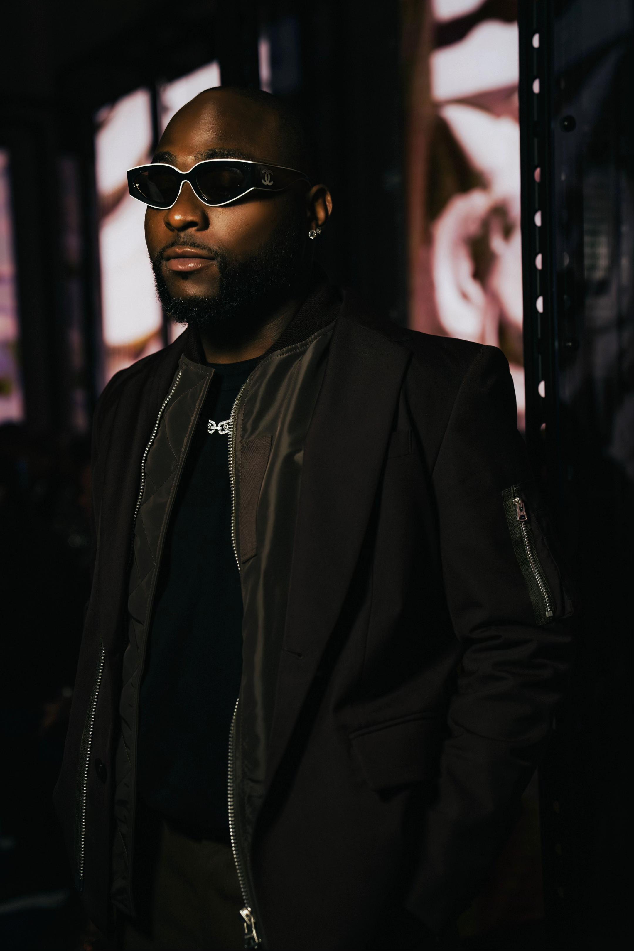 TikTok post by @davido for Messika. Caption reads: Big 🇳🇬 energy front row and on stage with....