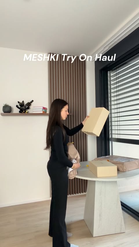Instagram post by @babickovaeli for Meshki. Caption reads: [...] start posting some reels🎀 Thank you @meshki....