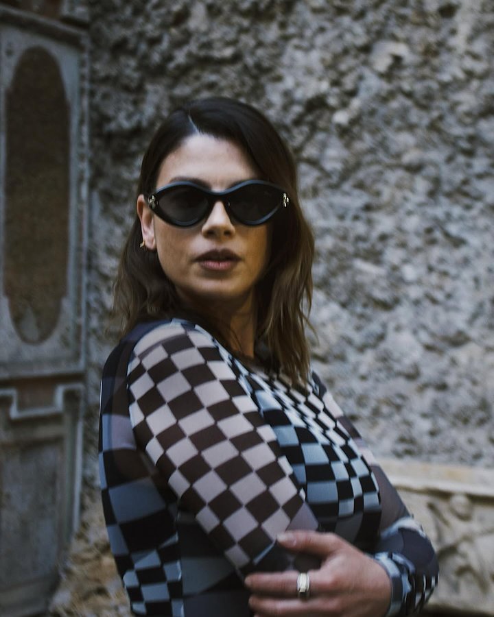 Instagram post by @real_brown for Marcolin. Caption reads: Pucci in Rome 🧡
@marcolin_eyewear @emiliopucci....