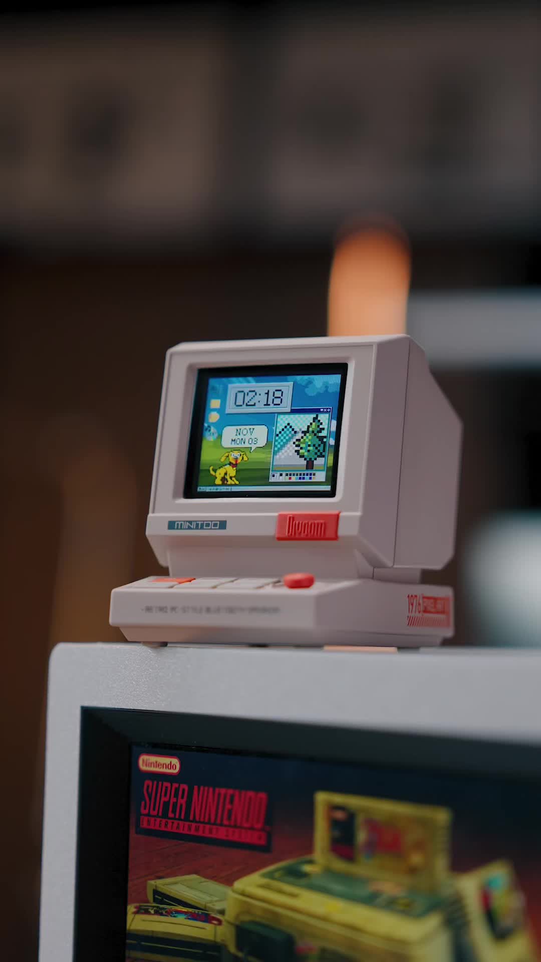 TikTok post by @chidsj for Divoom. Caption reads: A perfect blend of retro and modern tech 🖥️✨ This....