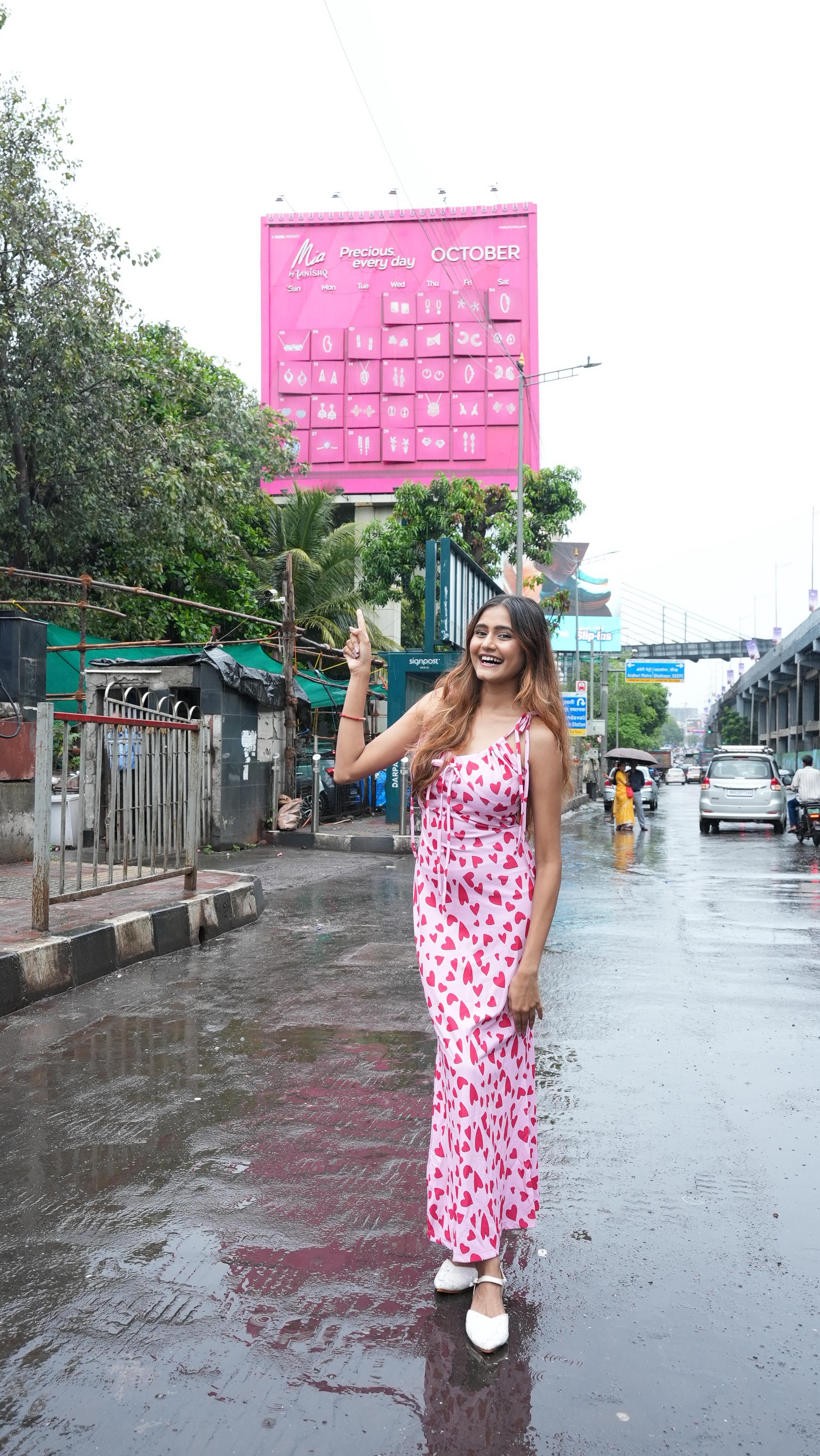 Instagram post by @janvi.limbachiyaa for Mia by Tanishq. Caption reads: Spotted this first-of-its-kind calendar billboard....