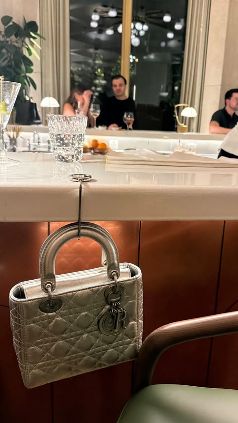 Instagram post by @thecatwilliams for Mine & Yours. Caption reads: holiday shopping date🌲🍾 @mineandyoursco is at....