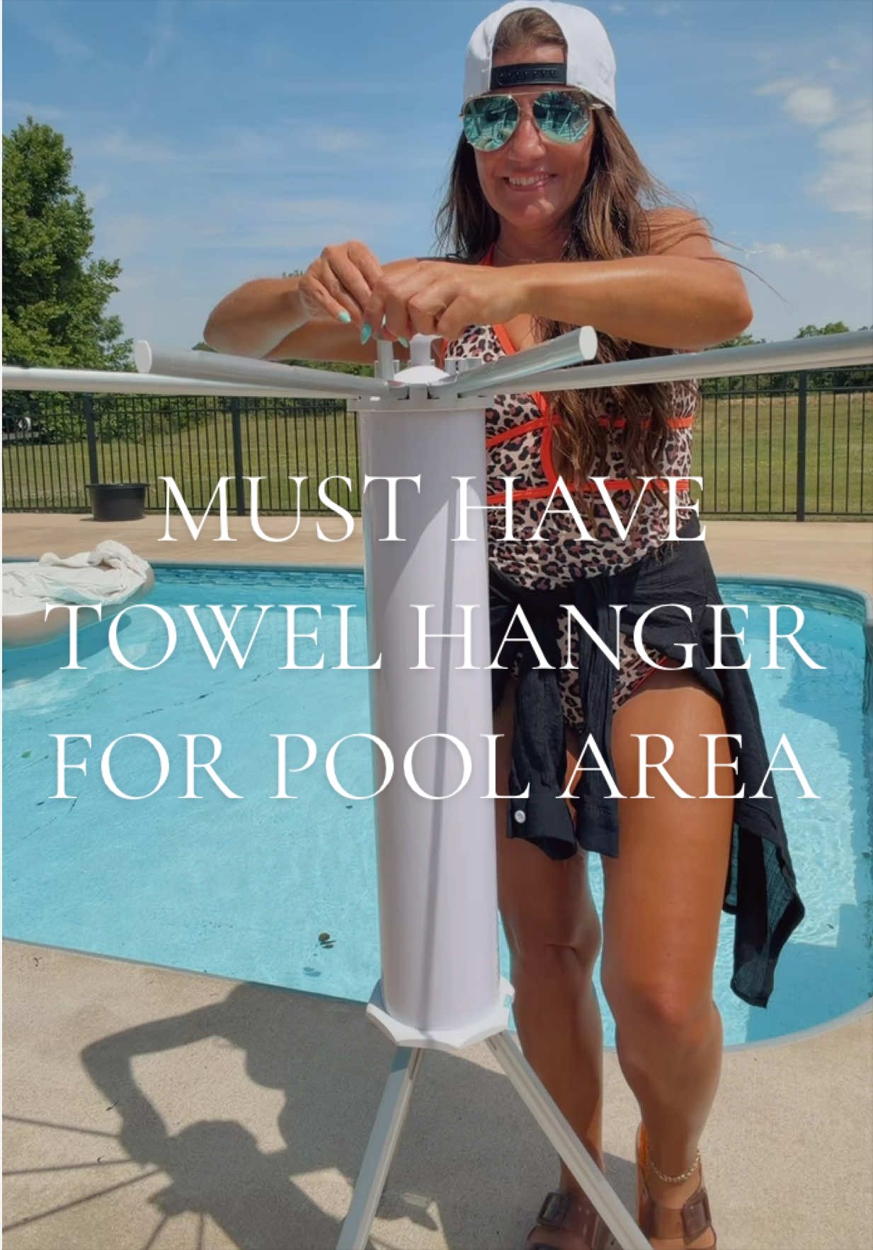 TikTok post by @aimeejaye for Songmics. Caption reads: [...] pool for towels and swimwear to dry.....
