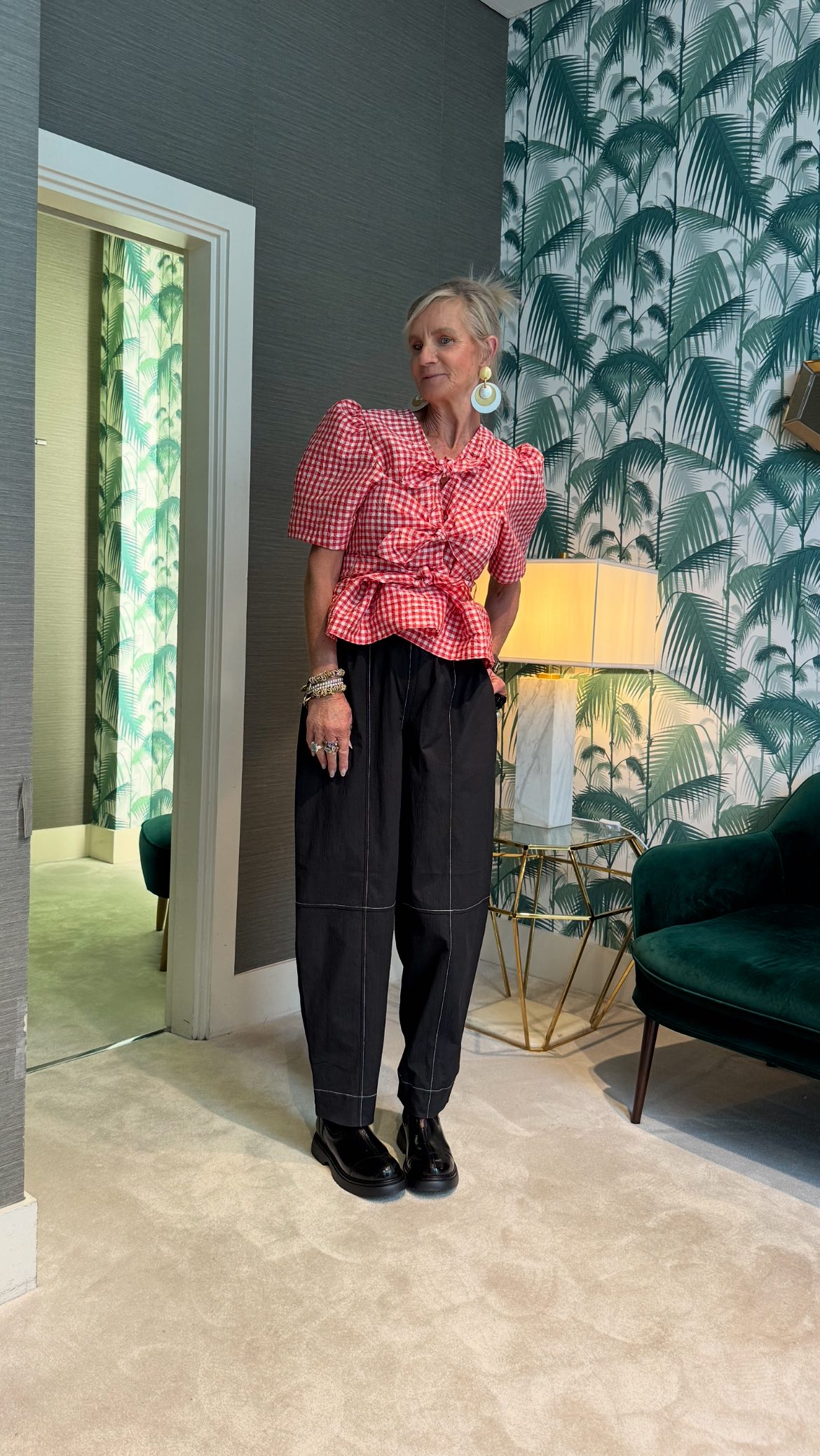 Instagram post by @mogzee_m for Strathberry. Caption reads: AD/ Come with me to @multreeswalk for a luxurious....