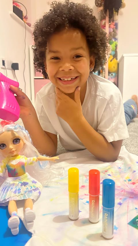 Instagram post by @lifewith.amiyah for Rainbow High. Caption reads: [...] fashionista finds her dream toy! The Rainbow....