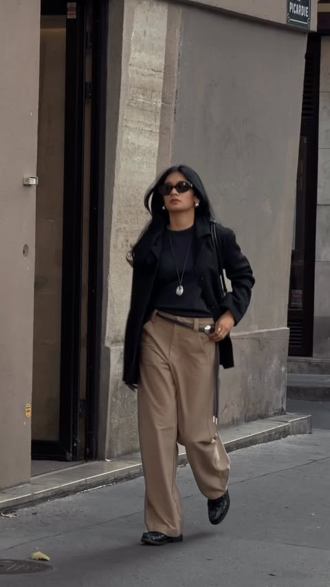 Instagram post by @kanchanalle for REVOLVE. Caption reads: fall color combo during #pfw @revolve....