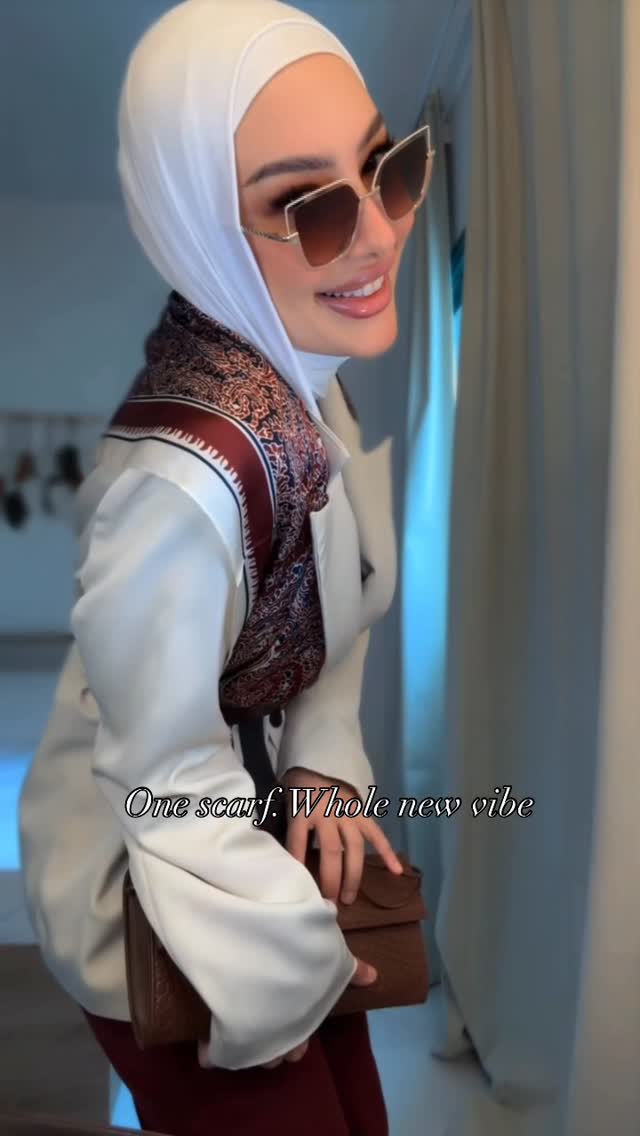 Instagram post by @dinaelattaar for eyewa. Caption reads: A simple look turned chic with a scarf and the....