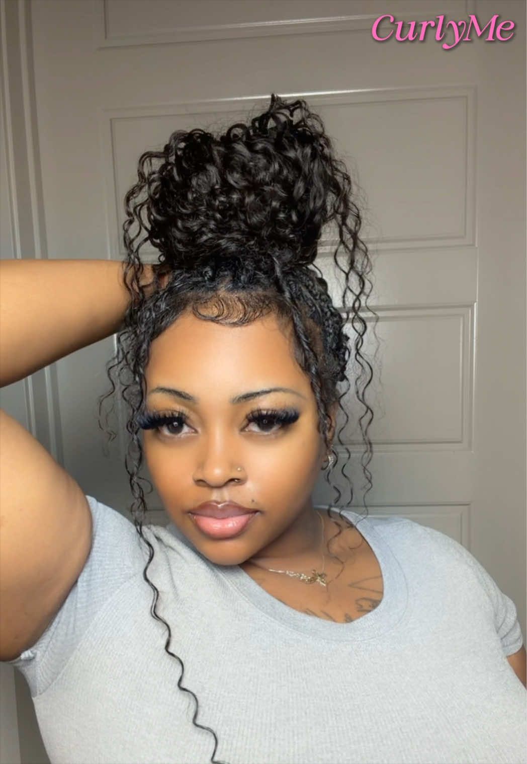 TikTok post by @stylisttraceyshenise for Curlyme. Caption reads: [...] water wave crochet hair from @CurlyMe Hair....