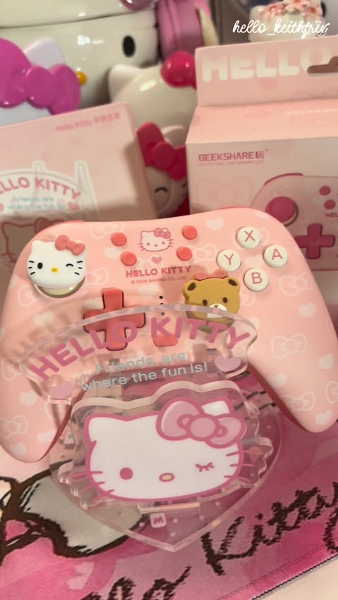 Instagram post by @hello_keithtrix for GeekShare. Caption reads: [...] Kitty wireless controller & stand from....