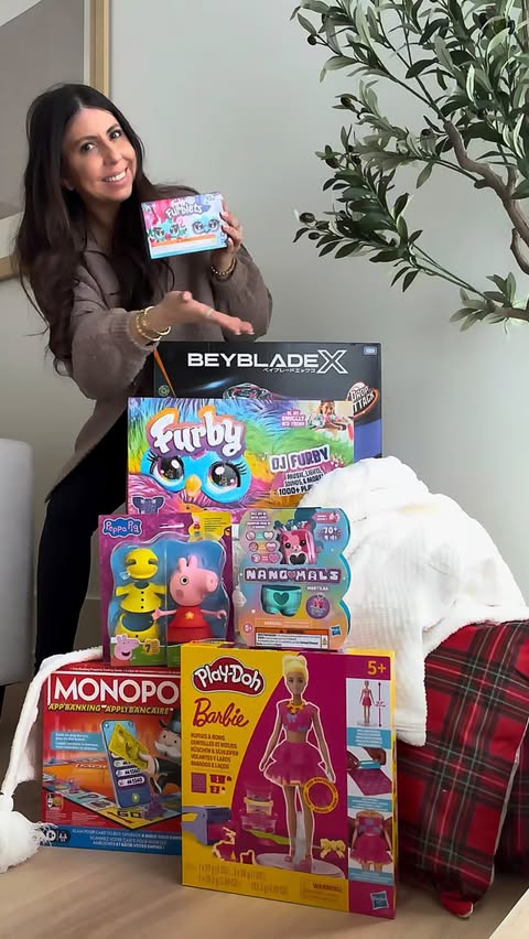 Instagram post by @themamabaee for Play-Doh. Caption reads: Your holiday toy inspo is officially unlocked ✨🎁....